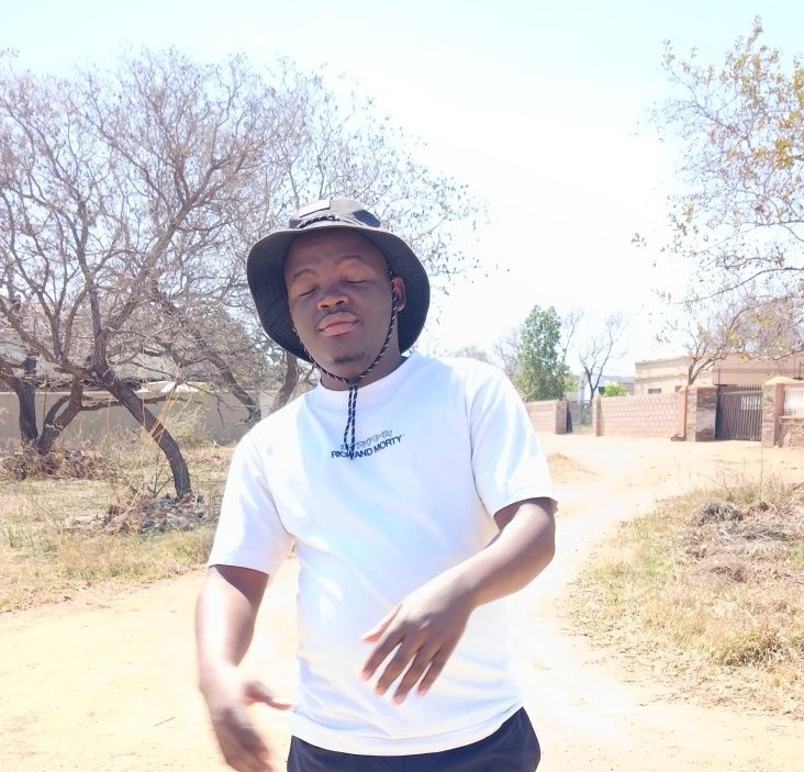 KgosiGodsent, 30, Botswana